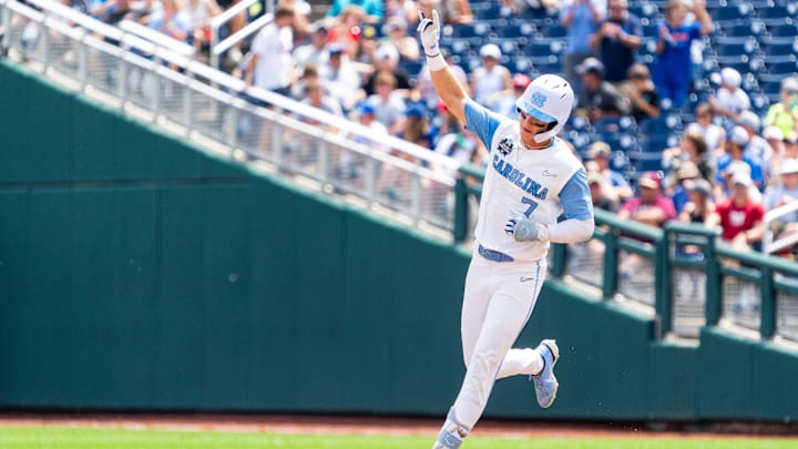 Jun 18, 2024; Omaha, NE, USA; North Carolina Tar Heels center fielder Vance Honeycutt (7) celebrates after hitting a three-run home run against the Florida State Seminoles during the fifth inning at Charles Schwab Field Omaha. 