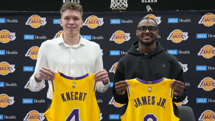 Jul 2, 2024; El Segundo, CA, USA; From left: Los Angeles Lakers first round draft pick Dalton Knecht (4) and second round draft pick Bronny James (9) pose at a press conference at the UCLA Health Training Center. Mandatory Credit: Kirby Lee-USA TODAY Sports