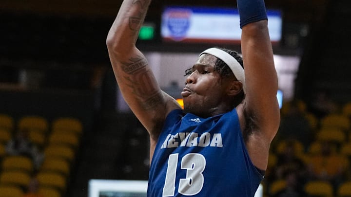 Jan 20, 2024; Laramie, Wyoming, USA; Nevada Wolf Pack guard Kenan Blackshear (13) shoots against the