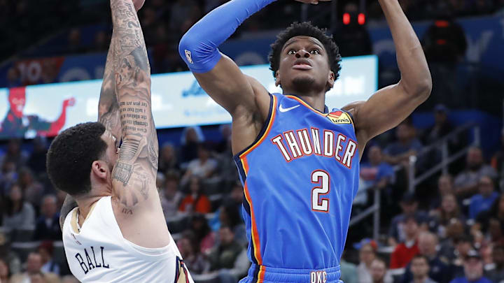 Nov 2, 2019; Oklahoma City, OK, USA; Oklahoma City Thunder guard Shai Gilgeous-Alexander (2) shoots as New Orleans Pelicans guard Lonzo Ball (2) defends during the second half at Chesapeake Energy Arena. Oklahoma City won 115-104. Mandatory Credit: Alonzo Adams-Imagn Images