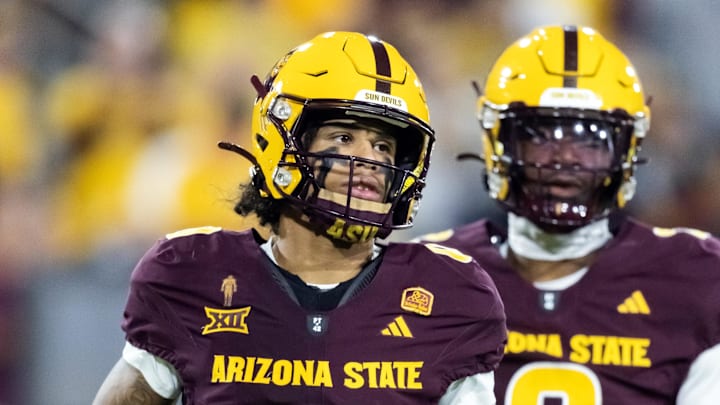 Nov 28, 2025; Tempe, Arizona, USA; Arizona State Sun Devils wide receiver Jordyn Tyson (0) and quarterback Jeff Sims (2) against the Arizona Wildcats during the 99th Territorial Cup at Mountain America Stadium. Mandatory Credit: Mark J. Rebilas-Imagn Images