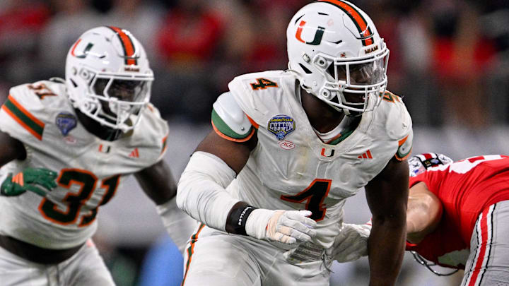 Dec 31, 2025; Arlington, TX, USA; Miami Hurricanes defensive lineman Rueben Bain Jr. (4) rushes the line during the 2025 Cotton Bowl and quarterfinal game of the College Football Playoff at AT&T Stadium. Mandatory Credit: Jerome Miron-Imagn Images