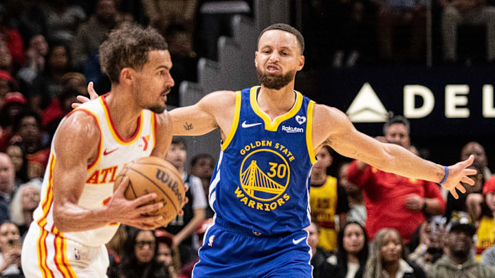 Feb 3, 2024; Atlanta, Georgia, USA; Atlanta Hawks guard Trae Young (11) defends the ball against Golden State Warriors guard Stephen Curry (30) during the fourth quarter at State Farm Arena. Mandatory Credit: Jordan Godfree-Imagn Images Feb 3, 2024; Atlanta, Georgia, USA; Atlanta Hawks guard Trae Young (11) defends the ball against Golden State Warriors guard Stephen Curry (30) during the fourth quarter at State Farm Arena. Mandatory Credit: Jordan Godfree-Imagn Images