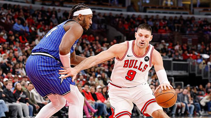 Jan 2, 2026; Chicago, Illinois, USA; Chicago Bulls center Nikola Vucevic (9) drives to the basket against Orlando Magic center Wendell Carter Jr. (34) during the first half at United Center. Mandatory Credit: Kamil Krzaczynski-Imagn Images Jan 2, 2026; Chicago, Illinois, USA; Chicago Bulls center Nikola Vucevic (9) drives to the basket against Orlando Magic center Wendell Carter Jr. (34) during the first half at United Center. Mandatory Credit: Kamil Krzaczynski-Imagn Images