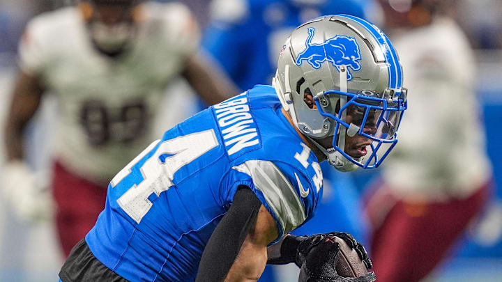Detroit Lions wide receiver Amon-Ra St. Brown (14) catches a pass late in the fourth quarter against Commanders
