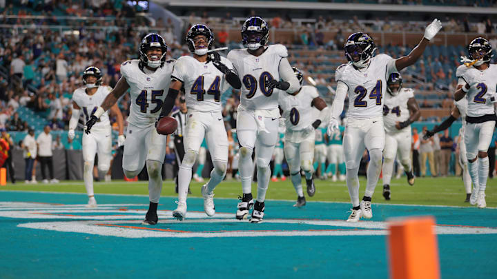 Oct 30, 2025; Miami Gardens, Florida, USA; Baltimore Ravens cornerback Marlon Humphrey (44) celebrates with teammates after recovering a fumble during the fourth quarter against the Miami Dolphins at Hard Rock Stadium. Mandatory Credit: Sam Navarro-Imagn Images