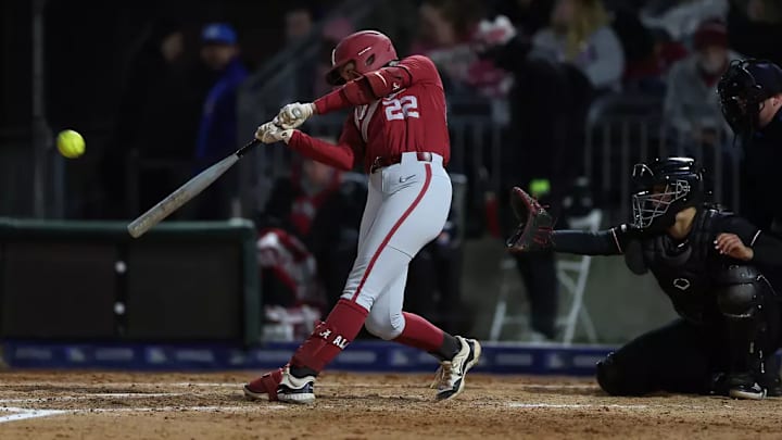 Alabama Softball Player Kali Heivilin (22) hits the ball against Jacksonville State at Toyota Field in Huntsville, AL on Tuesday, Feb 18, 2025.