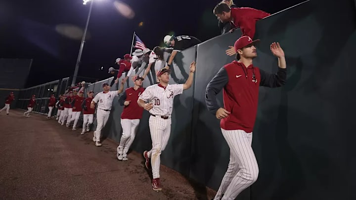 Alabama baseball players celebrate a win.