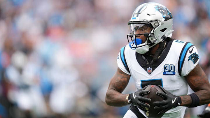 CHARLOTTE, NORTH CAROLINA - SEPTEMBER 29: Diontae Johnson #5 of the Carolina Panthers makes a catch against the Cincinnati Bengals during the game at Bank of America Stadium on September 29, 2024 in Charlotte, North Carolina.