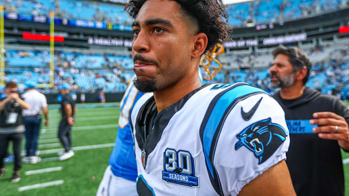 CHARLOTTE, NC - SEPTEMBER 15: Bryce Young #9 of the Carolina Panthers exits the field after a football game against the Los Angeles Chargers at Bank of America Stadium on September 15, 2024 in Charlotte, North Carolina.