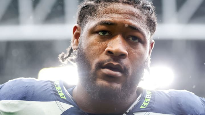 SEATTLE, WASHINGTON - NOVEMBER 24: Ernest Jones IV #13 of the Seattle Seahawks looks on against the Arizona Cardinals at Lumen Field on November 24, 2024 in Seattle, Washington.