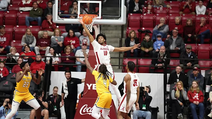 Alabama forward Mouhamed Dioubate (10) blocks a shot against Kent State at Coleman Coliseum in Tuscaloosa, AL on Sunday, Dec 22, 2024.