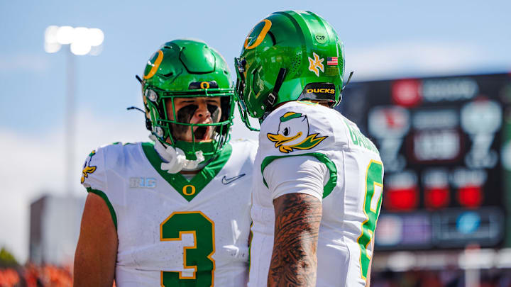 Oregon Ducks tight end terrance ferguson celebrates with quarterback dillon gabriel in an Oregon win. 