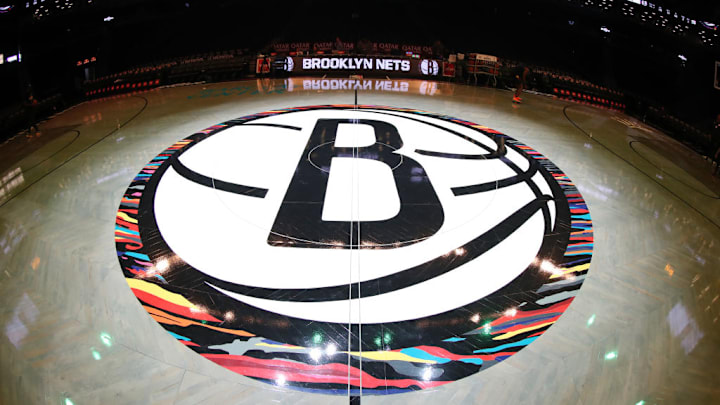 The Brooklyn Nets logo at half court on Dec. 8, 2019.