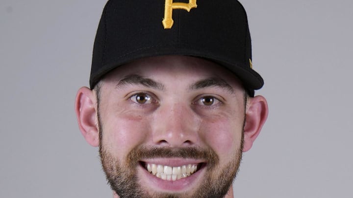 Feb 22, 2023; Bradenton, FL, USA; Pittsburgh Pirates pitcher Carter Bins (80) poses for photos