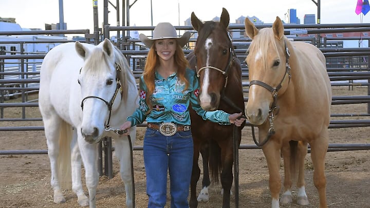Emily Beisel posing with her team outside of the Thomas and Mack Emily Beisel posing with her team outside of the Thomas and Mack