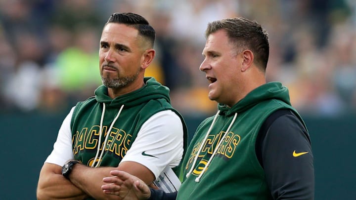 Green Bay Packers Head Coach Matt LaFleur and General Manager Brian Gutekunst talk on the field during Green Bay Packers Family Night on Aug. 2, 2025, at Lambeau Field in Green Bay, Wis.