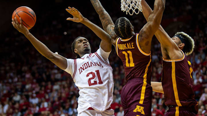 Indiana's Mackenzie Mgbako (21) shoots past Minnesota's Femi Odukale (11) during the Indiana versus Minnesota men's basketball game at Simon Skjodt Assembly Hall on Monday, Dec. 9, 2024. Indiana's Mackenzie Mgbako (21) shoots past Minnesota's Femi Odukale (11) during the Indiana versus Minnesota men's basketball game at Simon Skjodt Assembly Hall on Monday, Dec. 9, 2024.