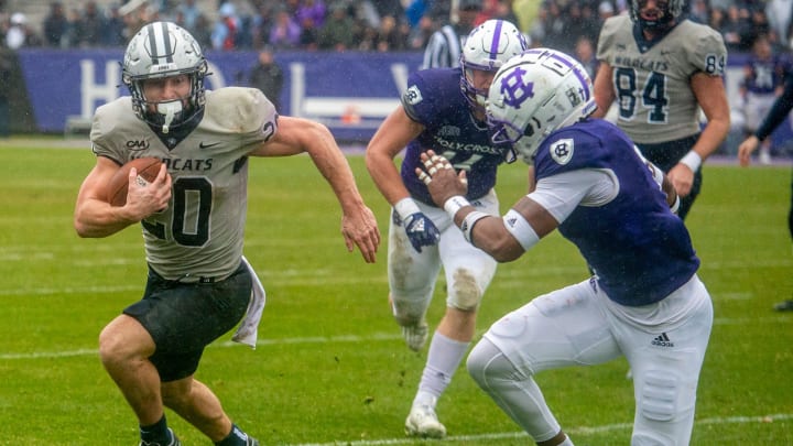 University of New Hampshire junior Dylan Laube runs against Holy Cross in the second round of the University of New Hampshire junior Dylan Laube runs against Holy Cross in the second round of the