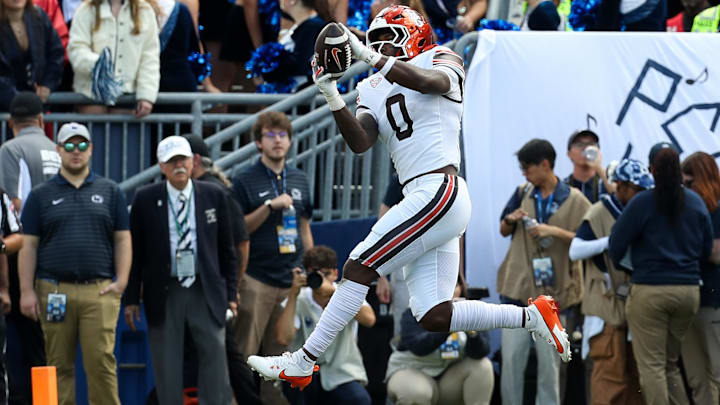 Sep 7, 2024; University Park, Pennsylvania, USA; Bowling Green Falcons tight end Harold Fannin Jr (0) makes a touchdown catch during the first quarter against the Penn State Nittany Lions at Beaver Stadium. 