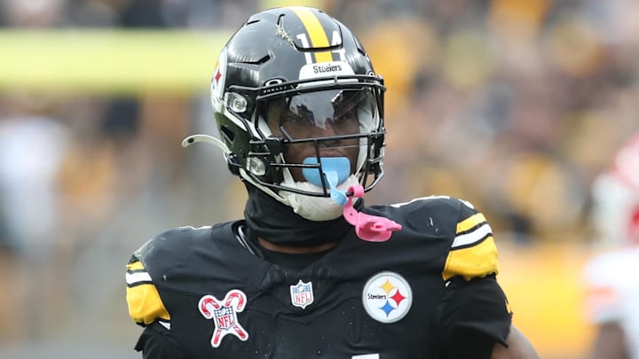 Dec 25, 2024; Pittsburgh, Pennsylvania, USA;  Pittsburgh Steelers wide receiver George Pickens (14) reacts after a first down against the Kansas City Chiefs during the second quarter at Acrisure Stadium. Mandatory Credit: Charles LeClaire-Imagn Images