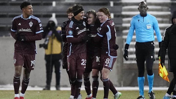Colorado Rapids midfielder Djordje Mihailovic (10) (center) celebrates his free kick goal with midfielder Cole Bassett (23), midfielder Oliver Larraz (8) and defender Ian Murphy (19) in the second half at Dick's Sporting Goods Park 