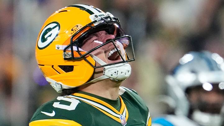 Green Bay Packers receiver Christian Watson (9) celebrates a first down against the Panthers. Green Bay Packers receiver Christian Watson (9) celebrates a first down against the Panthers.