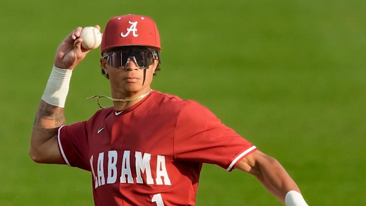 Feb 18, 2025; Tuscaloosa, Alabama, USA; Alabama shortstop Justin Lebron throws to first to record and out against Middle Tennessee State at Sewell-Thomas Stadium.