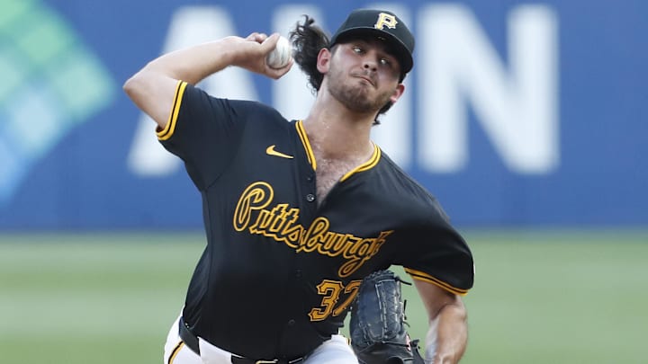 Aug 27, 2024; Pittsburgh, Pennsylvania, USA;  Pittsburgh Pirates starting pitcher Jared Jones (37) delivers a pitch against the Chicago Cubs during the first inning at PNC Park. Mandatory Credit: Charles LeClaire-Imagn Images