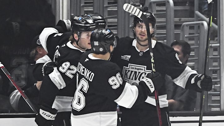 Mar 22, 2025; Los Angeles, California, USA; The Los Angeles Kings celebrate after scoring against the Carolina Hurricanes during the first period at Crypto.com Arena. Mandatory Credit: Jonathan Hui-Imagn Images
