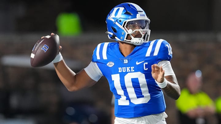 Aug 28, 2025; Durham, North Carolina, USA; Duke Blue Devils quarterback Darian Mensah (10) goes to throw the ball against the Elon Phoenix during the first half at Wallace Wade Stadium. Mandatory Credit: James Guillory-Imagn Images Aug 28, 2025; Durham, North Carolina, USA; Duke Blue Devils quarterback Darian Mensah (10) goes to throw the ball against the Elon Phoenix during the first half at Wallace Wade Stadium. Mandatory Credit: James Guillory-Imagn Images
