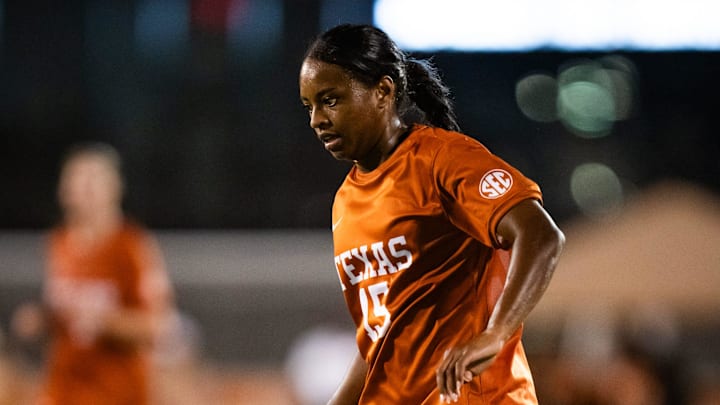 Texas Longhorns forward Trinity Byars plays the ball during the game.