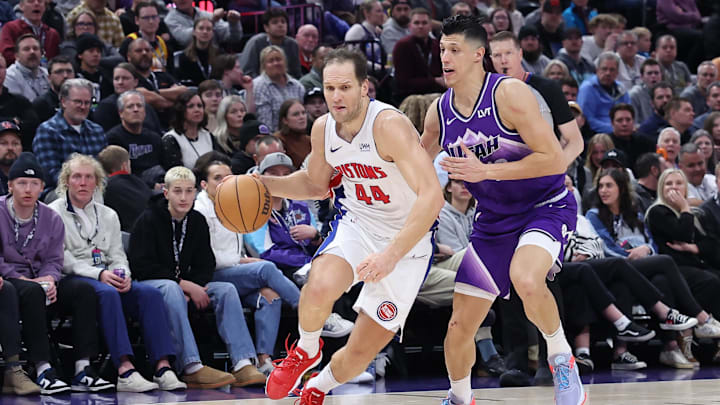 Jan 3, 2024; Salt Lake City, Utah, USA; Detroit Pistons forward Bojan Bogdanovic (44) drives against Utah Jazz forward Simone Fontecchio (16) during the fourth quarter at Delta Center. Mandatory Credit: Rob Gray-Imagn Images