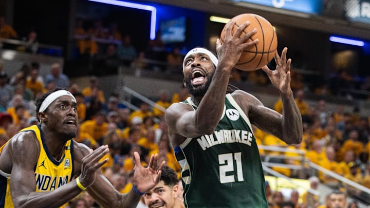 May 2, 2024; Indianapolis, Indiana, USA; Milwaukee Bucks guard Patrick Beverley (21) shoots the ball while Indiana Pacers forward Pascal Siakam (43) defends during game six of the first round for the 2024 NBA playoffs at Gainbridge Fieldhouse. Mandatory Credit: Trevor Ruszkowski-USA TODAY Sports