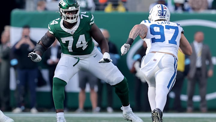Nov 17, 2024; East Rutherford, New Jersey, USA; New York Jets offensive tackle Olu Fashanu (74) blocks against Indianapolis Colts defensive end Laiatu Latu (97) during the second quarter at MetLife Stadium. Mandatory Credit: Brad Penner-Imagn Images Nov 17, 2024; East Rutherford, New Jersey, USA; New York Jets offensive tackle Olu Fashanu (74) blocks against Indianapolis Colts defensive end Laiatu Latu (97) during the second quarter at MetLife Stadium. Mandatory Credit: Brad Penner-Imagn Images