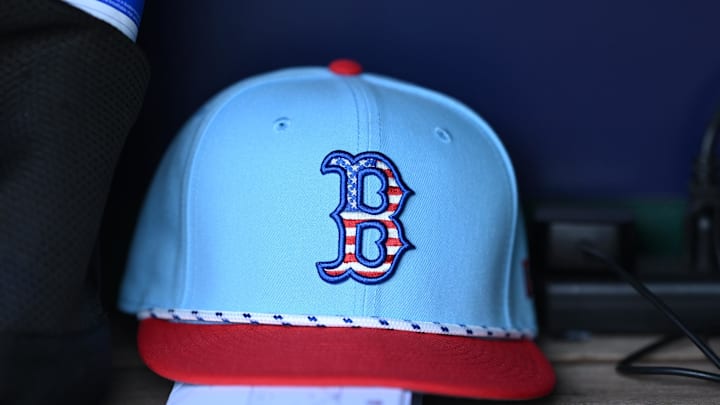 Jul 4, 2025; Washington, District of Columbia, USA; A 4th of July themed Boston Red Sox cap rests in the dugout during a game against the Washington Nationals at Nationals Park. Mandatory Credit: Rafael Suanes-Imagn Images