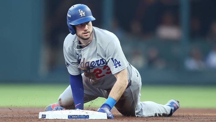 Oct 6, 2026; Cumberland, Georgia, USA;  Los Angeles Dodgers outfielder Kyle Tucker (23) steals second base against the Atlanta Braves during the second inning in game three of the NLDS for the 2026 MLB Playoffs at Truist Park.  Mandatory Credit: Brett Davis-Imagn Images
