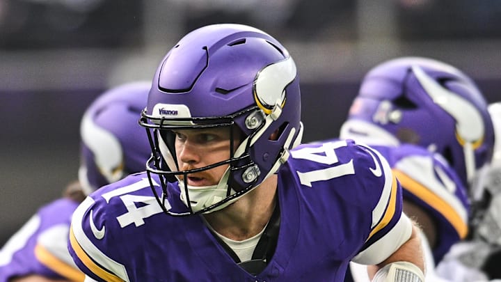 Dec 1, 2024; Minneapolis, Minnesota, USA; Minnesota Vikings quarterback Sam Darnold (14) looks to hand the ball off against the Arizona Cardinals during the first quarter at U.S. Bank Stadium. Mandatory Credit: Jeffrey Becker-Imagn Images