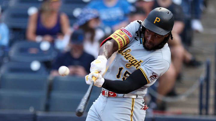 Mar 31, 2025; St. Petersburg, Florida, USA; Pittsburgh Pirates center fielder Oneil Cruz (15) hits a base hit against the Tampa Bay Rays in the first inning at George M. Steinbrenner Field. Mandatory Credit: Nathan Ray Seebeck-Imagn Images Mar 31, 2025; St. Petersburg, Florida, USA; Pittsburgh Pirates center fielder Oneil Cruz (15) hits a base hit against the Tampa Bay Rays in the first inning at George M. Steinbrenner Field. Mandatory Credit: Nathan Ray Seebeck-Imagn Images