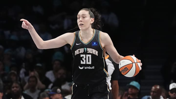 Stewart dribbles the ball against the Las Vegas Aces during game one of the 2024 WNBA Semi-finals at Barclays Center. Stewart dribbles the ball against the Las Vegas Aces during game one of the 2024 WNBA Semi-finals at Barclays Center.