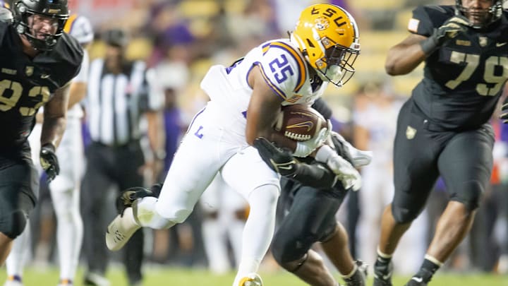 Trey Holly (25) runs the ball as the LSU Tigers take on the the Army Black Knights in Tiger Stadium