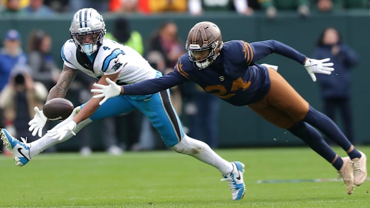 Green Bay Packers cornerback Carrington Valentine (24) breaks up a pass to Carolina Panthers wide receiver Tetairoa McMillan (4) on Sunday, November 2, 2025, at Lambeau Field in Green Bay, Wis. Carolina defeated Grewen Bay 16-13.
Wm. Glasheen USA TODAY NETWORK-Wisconsin