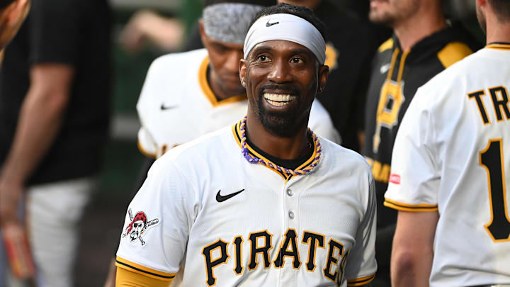 Jun 9, 2025; Pittsburgh, Pennsylvania, USA;  Pittsburgh Pirates designated hitter Andrew McCutchen (20) celebrates after scoring against the Miami Marlins during the third inning at PNC Park. Mandatory Credit: Philip G. Pavely-Imagn Images