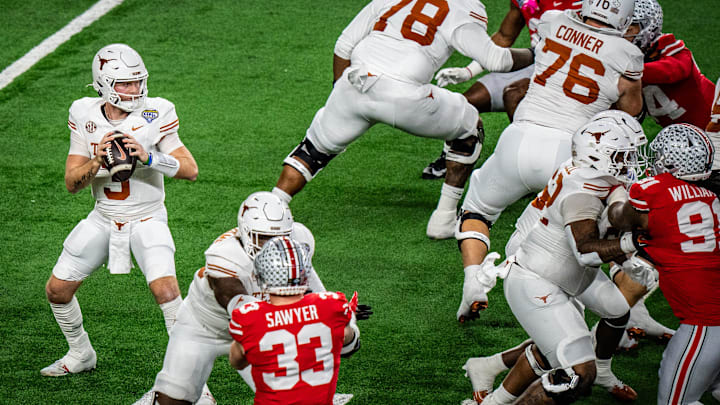 Texas Longhorns quarterback Quinn Ewers (3) looks for a pass in the first quarter as the Texas Longhorns play the Ohio State Buckeyes in the Cotton Bowl College Football Playoff semi-final at AT&T Stadium in Dallas, Texas, Jan. 10, 2025. Texas Longhorns quarterback Quinn Ewers (3) looks for a pass in the first quarter as the Texas Longhorns play the Ohio State Buckeyes in the Cotton Bowl College Football Playoff semi-final at AT&T Stadium in Dallas, Texas, Jan. 10, 2025.