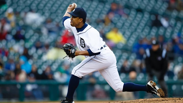 April 10, 2013; Detroit, MI, USA; Detroit Tigers relief pitcher Octavio Dotel (20) pitches in the seventh inning against the Toronto Blue Jays at Comerica Park. 