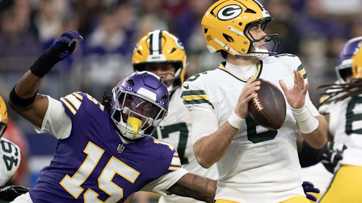 Jan 4, 2026; Minneapolis, Minnesota, USA; Minnesota Vikings linebacker Dallas Turner (15) pressures Green Bay Packers quarterback Clayton Tune (6) during the first quarter at U.S. Bank Stadium.