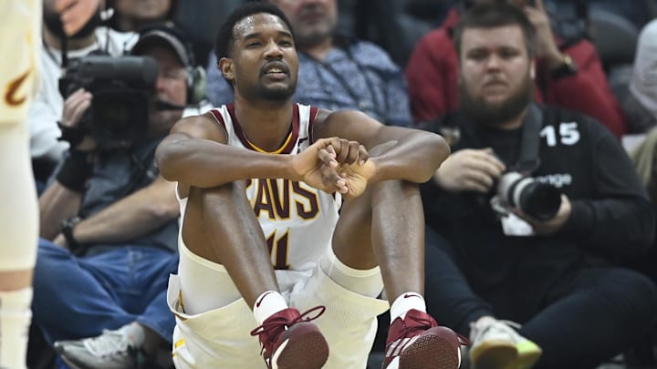 Mar 28, 2022; Cleveland, Ohio, USA; Cleveland Cavaliers center Evan Mobley (4) reacts after he was knocked to the floor in the second quarter against the Orlando Magic at Rocket Mortgage FieldHouse. Mandatory Credit: David Richard-Imagn Images