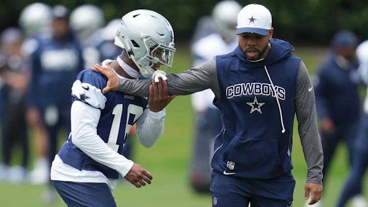 Dallas Cowboys cornerback Caleb Downs and defensive coordinator Christian Parker.