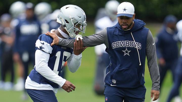 Dallas Cowboys cornerback Caleb Downs and defensive coordinator Christian Parker. Dallas Cowboys cornerback Caleb Downs and defensive coordinator Christian Parker.
