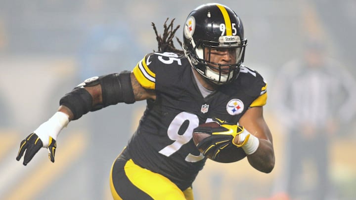Dec 6, 2015; Pittsburgh, PA, USA; Pittsburgh Steelers outside linebacker Jarvis Jones (95) runs after intercepting the ball against the Indianapolis Colts during the first quarter at Heinz Field. Mandatory Credit: Charles LeClaire-Imagn Images